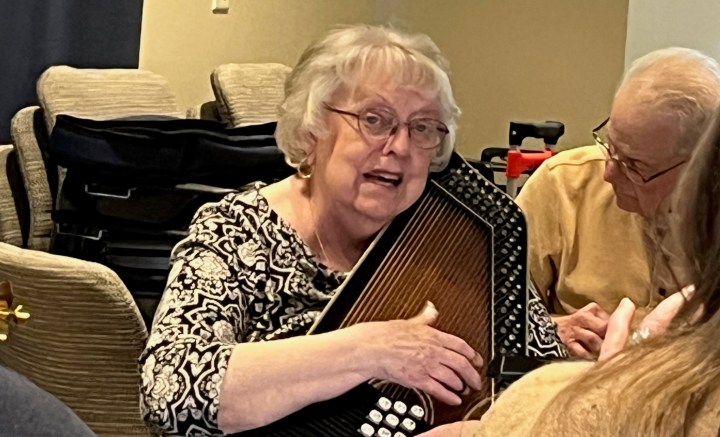 Patricia playing the autoharp